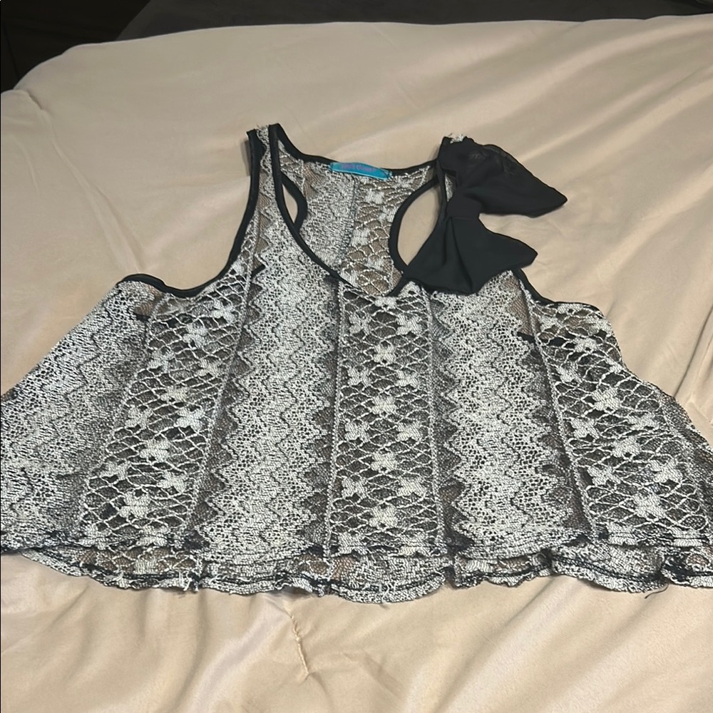 Julie's Closet Black and White Asymmetrical Top shorter in the front
